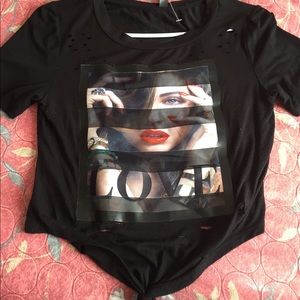 Black love shirt with a picture in the middle